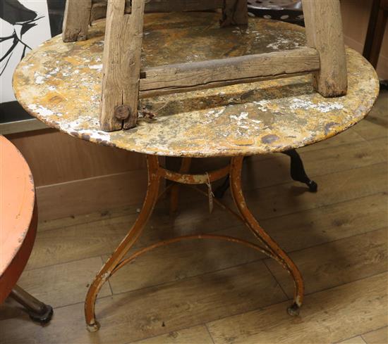 A painted metal circular topped bistro table W.87.5cm